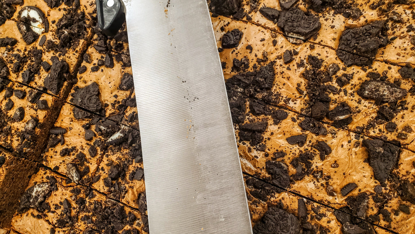 Cookies & Cream Brownie knife on pan