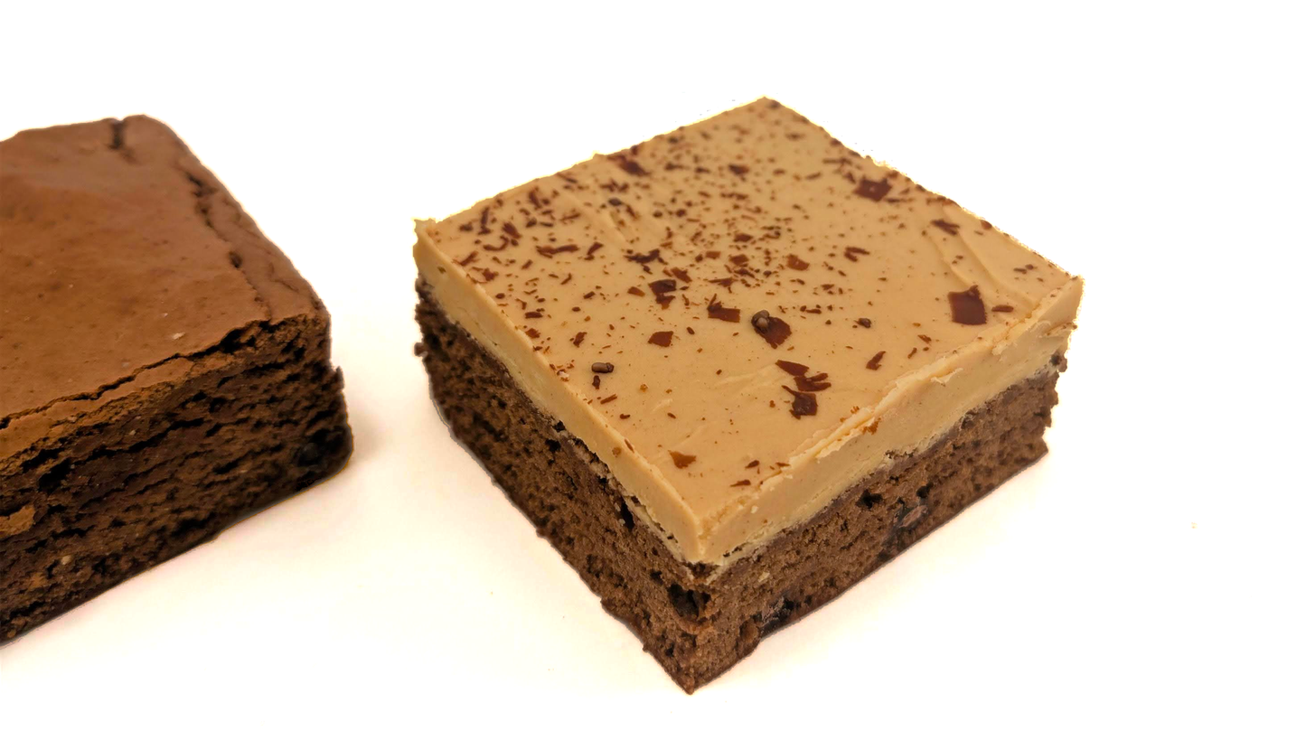 Large Peanut Butter Fudge Buckeye Brownie next to Fudgy Brownie