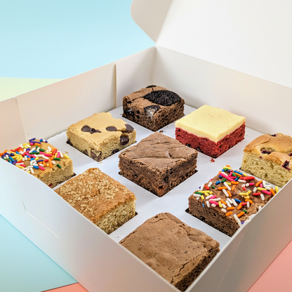 Box of 9 Brownies and Blondies open multi color backdrop close up