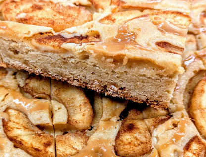 Caramel Apple Blondie piece lifted to reveal soft, chewy cinnamon blondie interior with caramel apple topping — Buckabee Brownies fall seasonal treat