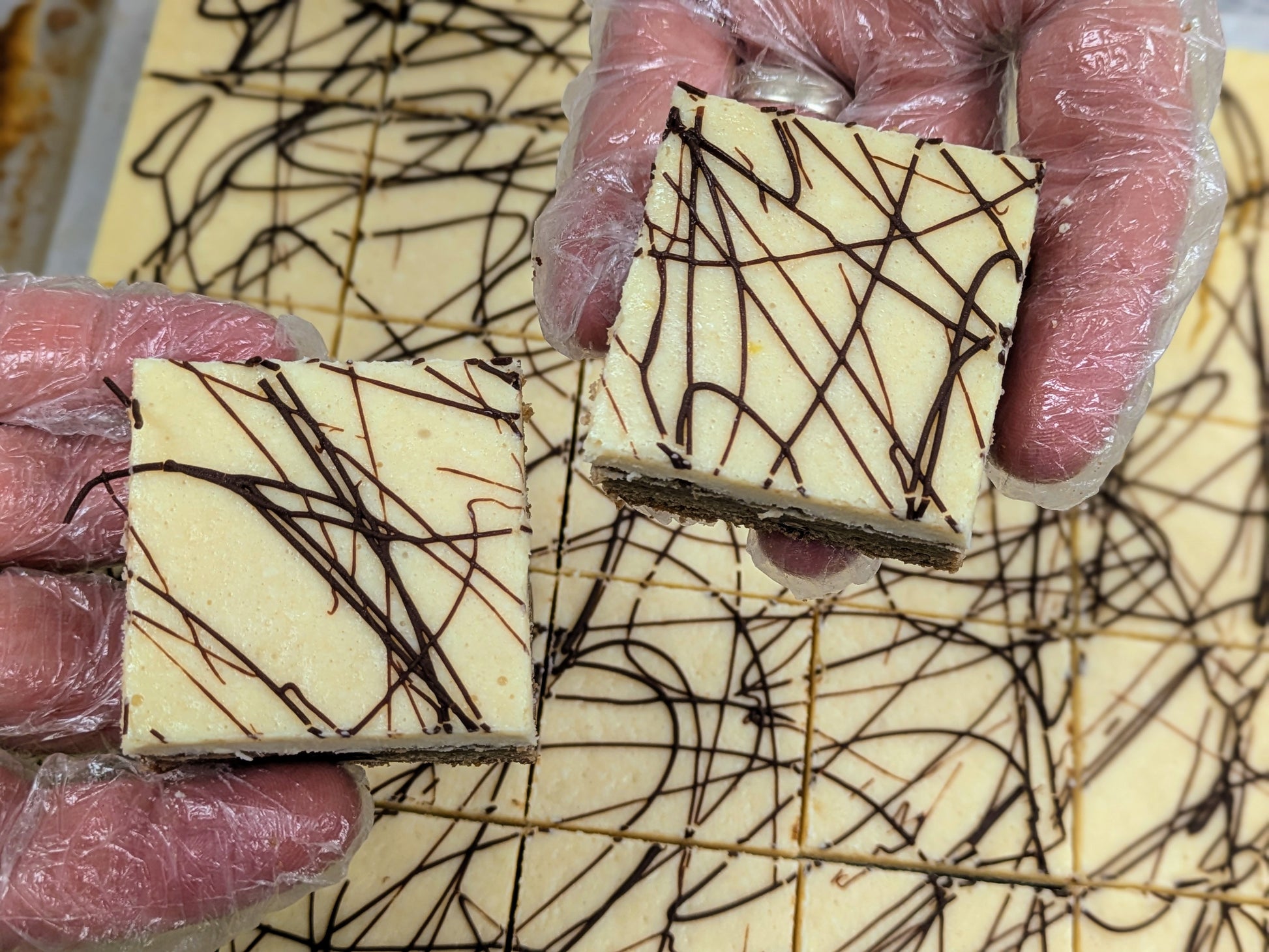 Irish Cream Cheese Brownie in hand for St. Patrick's Day