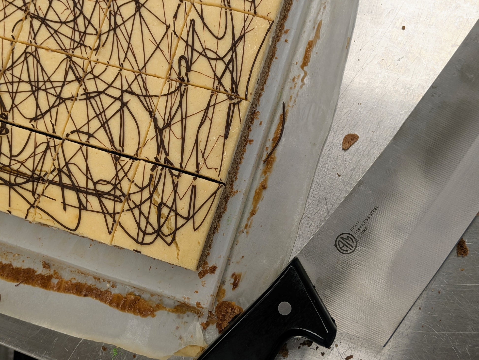 Irish Cream Cheese Brownie with knife for St. Patrick's Day