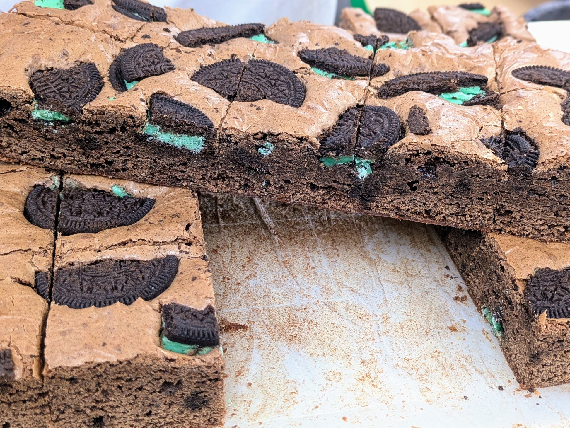 Mint Cookies & Cream Brownie in pan two layers for St. Patrick's Day