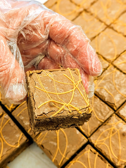 Orange Fudgy Chocolate Brownie in hand