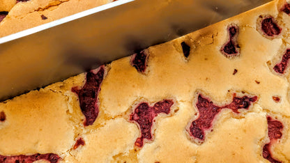 Raspberry White Chocolate Blondie cut by hand