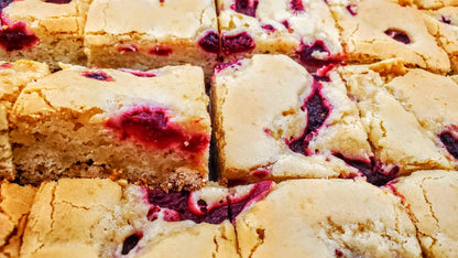 Raspberry White Chocolate Blondie cut in pan