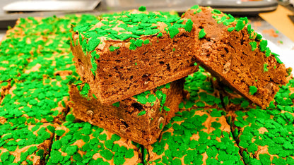 Shamrock Sprinkles Brownie stacked in pan for St. Patrick's Day