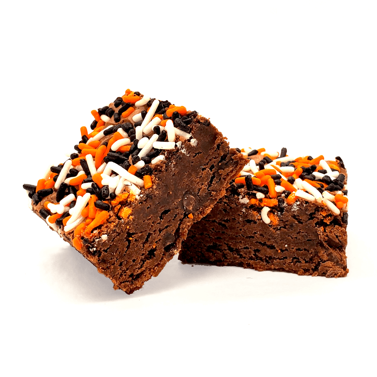 Two chocolate brownies topped with orange, white, and black sprinkles, photographed on a clean white background.