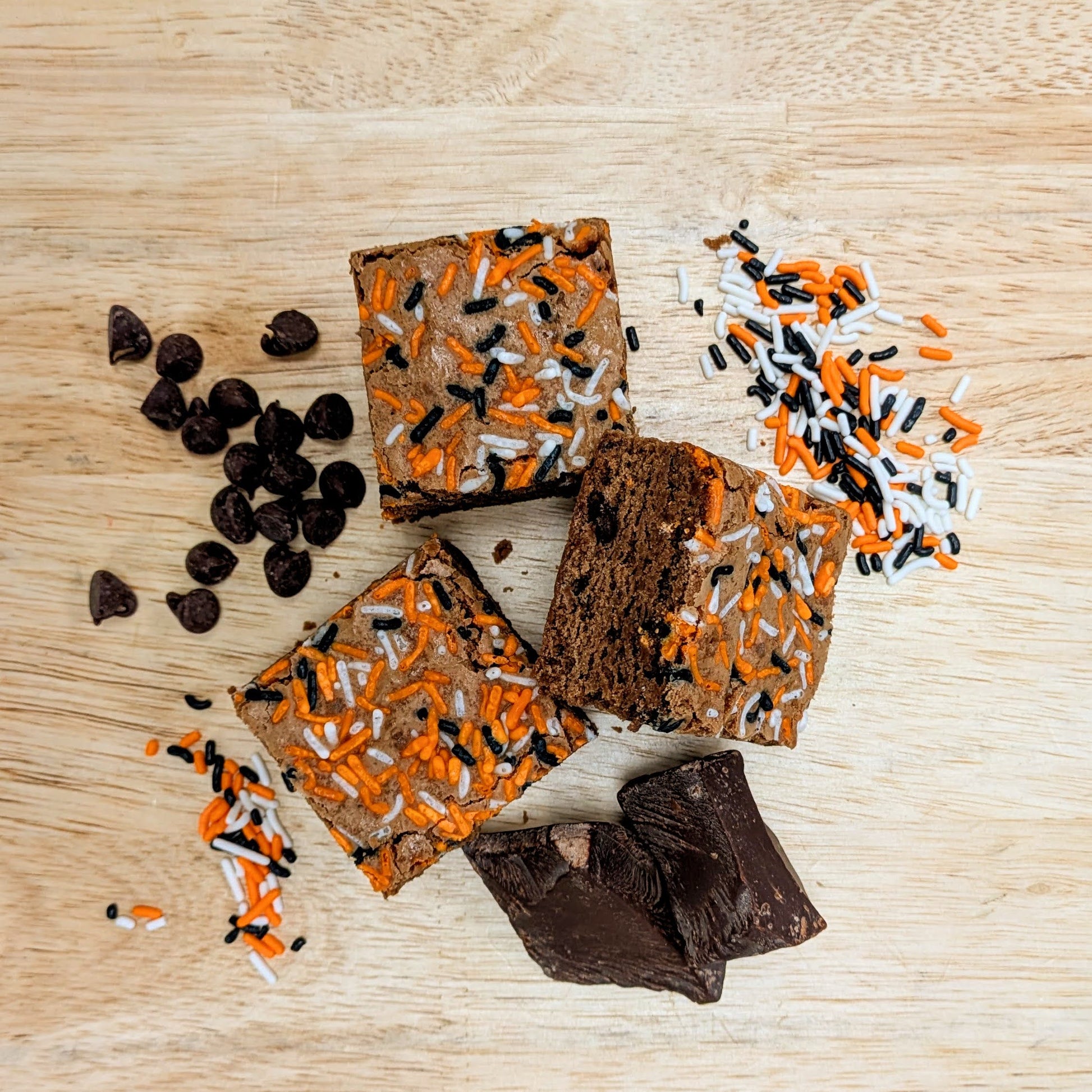Who Dey Brownie with sprinkles and chocolate chips on a wooden surface