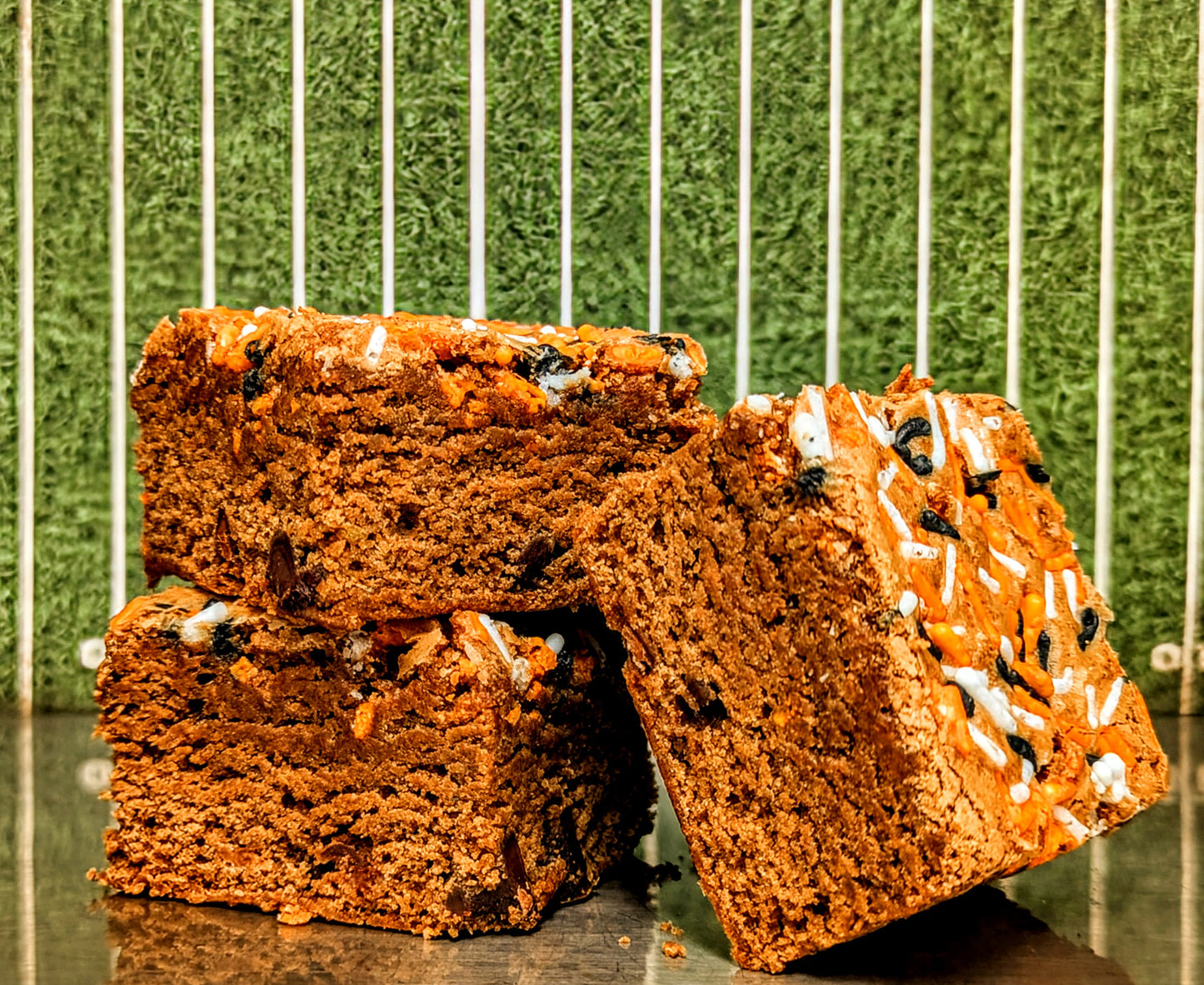 Three brownies with orange, white and black sprinkles to celebrate Cincinnati Football.