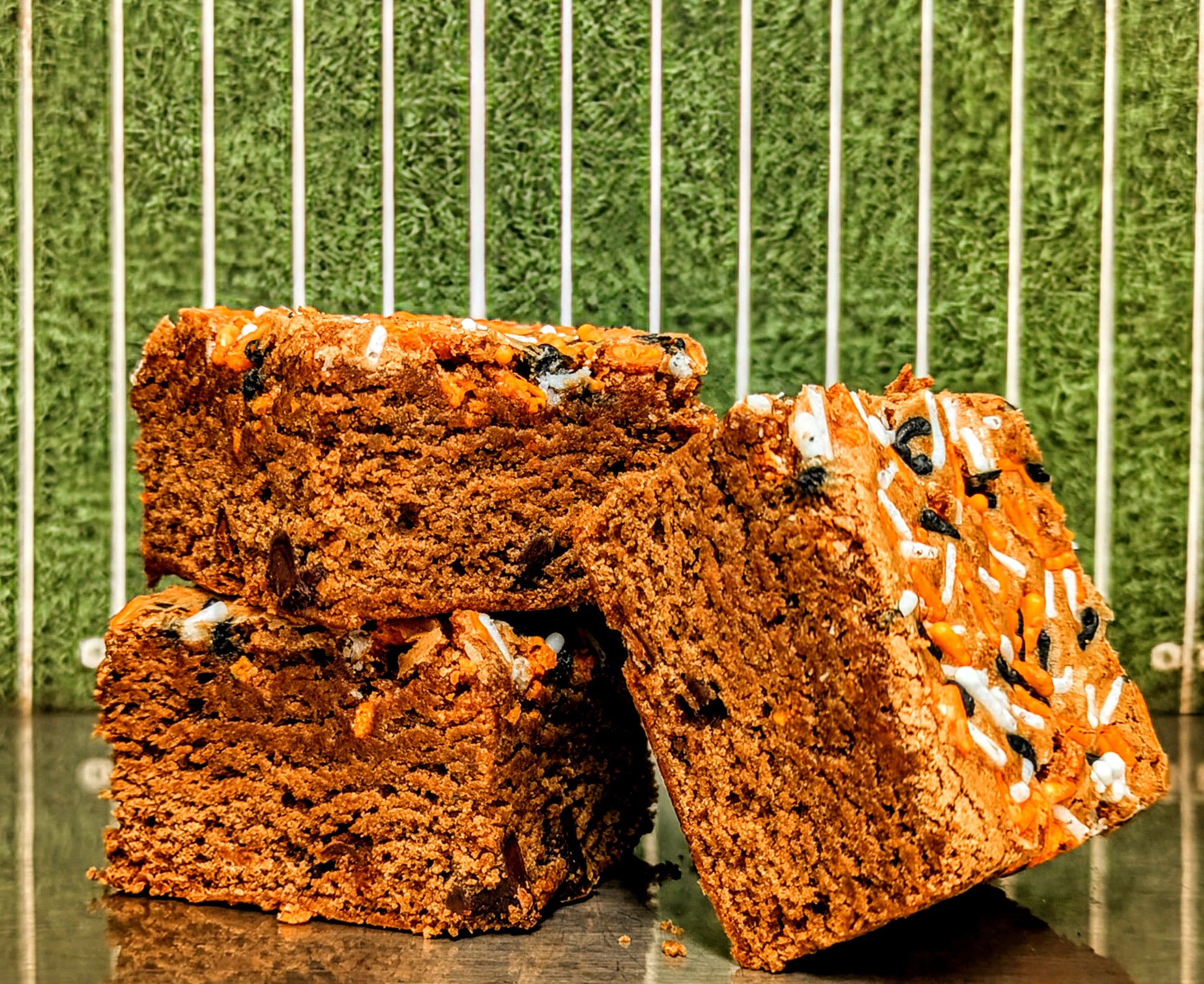 Three brownies with orange, white and black sprinkles to celebrate Cincinnati Football.
